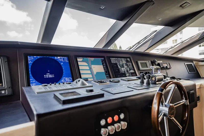 Slide: The Image of Cockpit of 2011 Sunseeker 34 Metre Yacht with navigation controls and displays. - 42