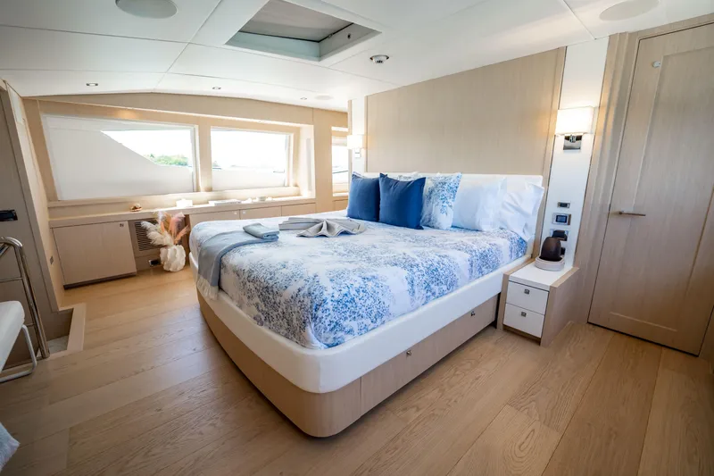 Slide: The Image of Luxurious bedroom interior on a 2011 Sunseeker 34 Metre Yacht, featuring elegant decor. - 46
