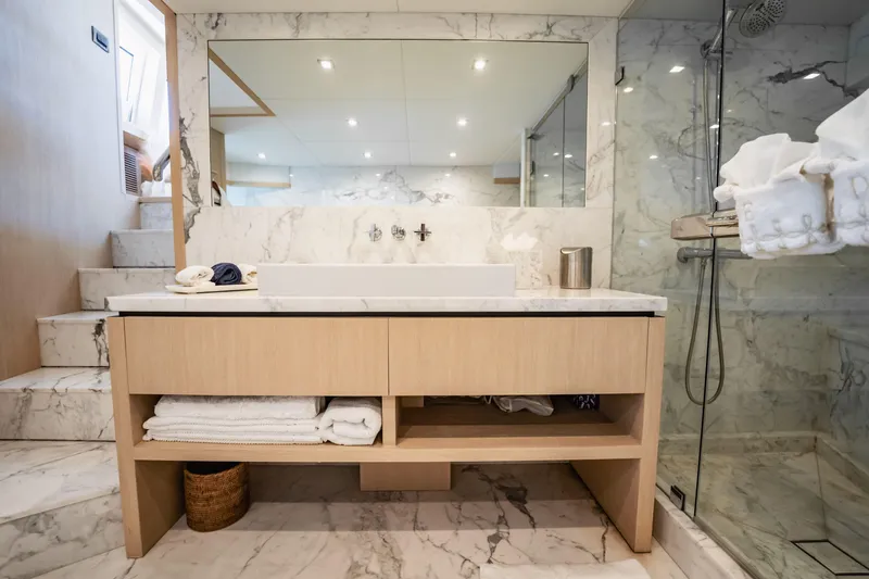 Slide: The Image of Luxurious marble bathroom on 2011 Sunseeker 34 Metre Yacht with modern fixtures and elegant design. - 52