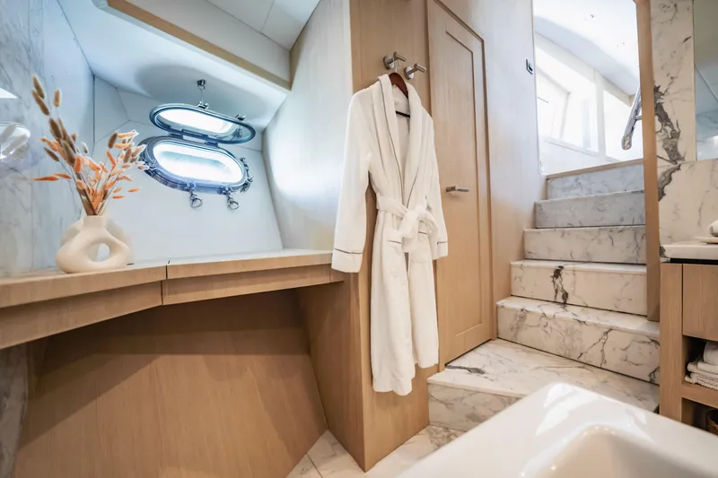Slide: The Image of Luxurious bathroom on 2011 Sunseeker 34 Metre Yacht with marble stairs and robe. - 54