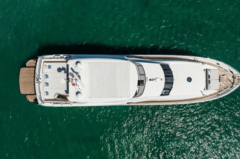 Slide: The Image of Overhead view of 2011 Sunseeker 34 Metre Yacht on clear turquoise water. - 6