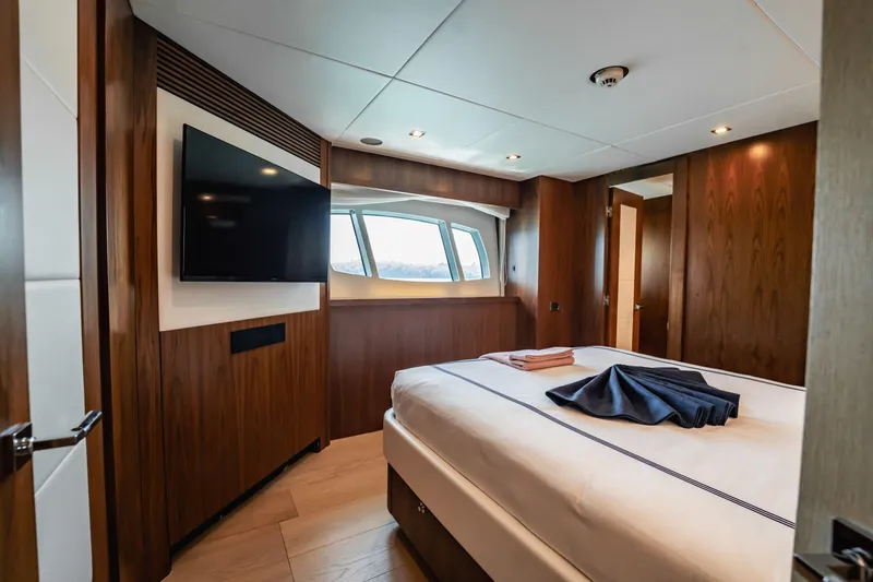 Slide: The Image of Luxurious bedroom interior on 2011 Sunseeker 34 Metre Yacht with modern amenities. - 61