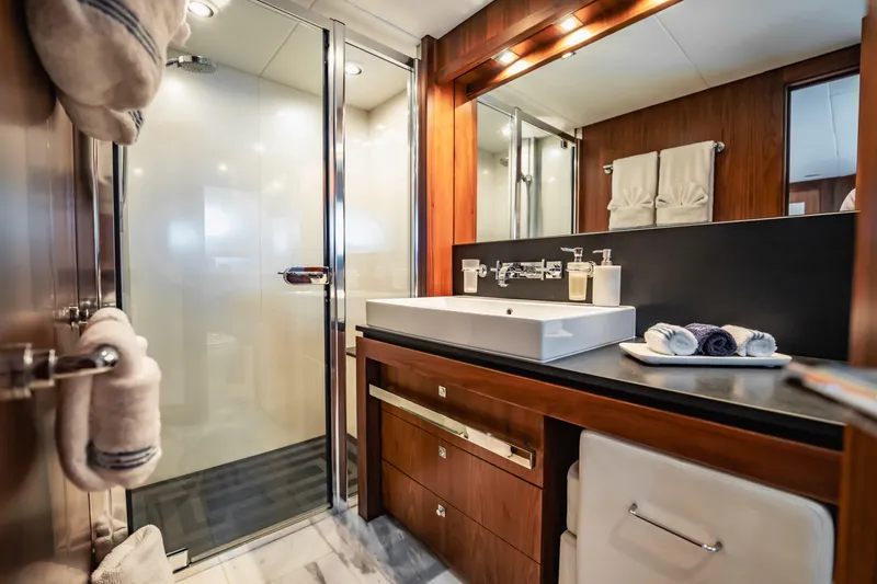 Slide: The Image of Luxurious bathroom on 2011 Sunseeker 34 Metre Yacht with modern fixtures and elegant design. - 62