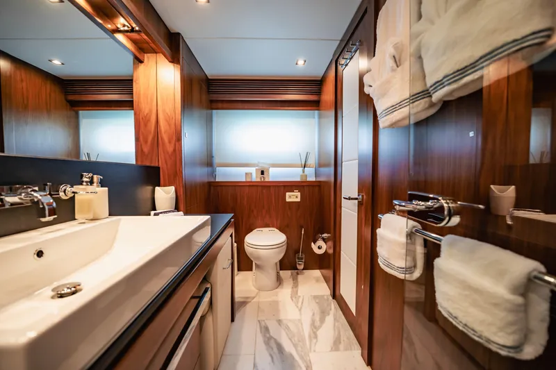 Slide: The Image of Luxurious bathroom on 2011 Sunseeker 34 Metre Yacht with elegant wood finishes. - 63