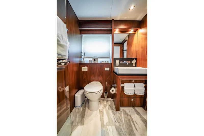Slide: The Image of Luxurious bathroom on 2011 Sunseeker 34 Metre Yacht with elegant wood finishes. - 65