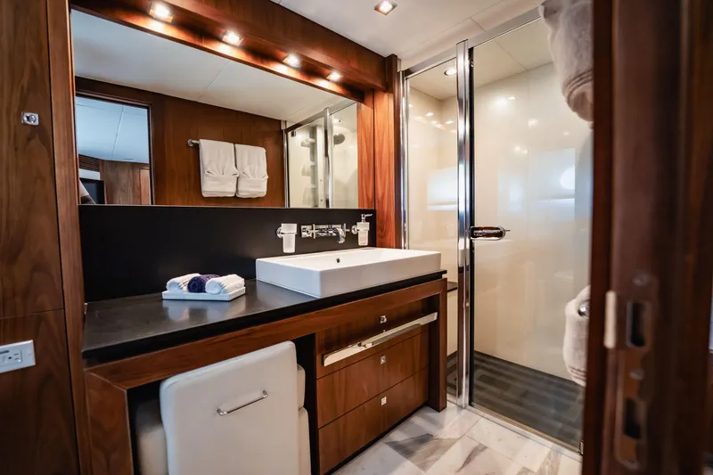 Slide: The Image of Luxurious bathroom on 2011 Sunseeker 34 Metre Yacht with modern fixtures and elegant wood finishes. - 66