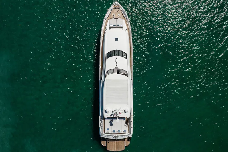 Slide: The Image of Overhead view of a 2011 Sunseeker 34 Metre Yacht on clear green water. - 7