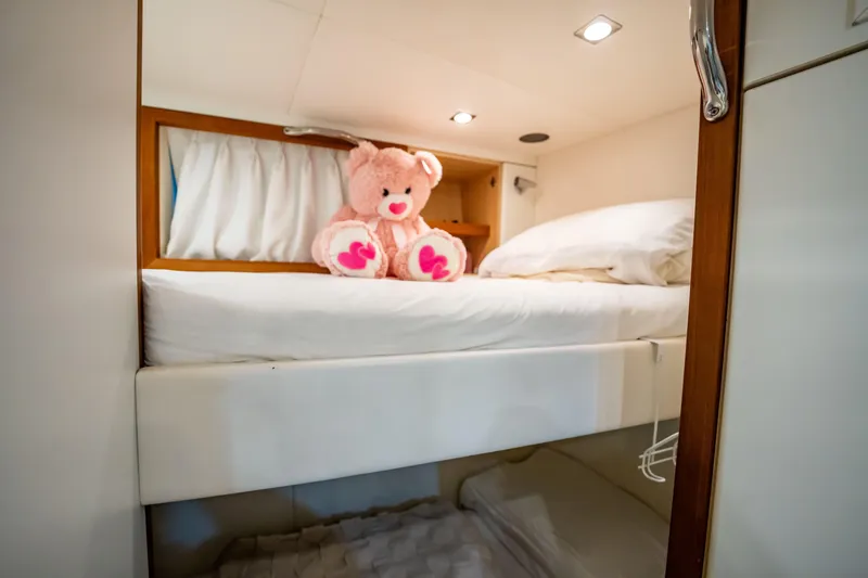 Slide: The Image of Cozy yacht cabin with bunk beds and a pink teddy bear, Sunseeker 34 Metre Yacht, 2011. - 72