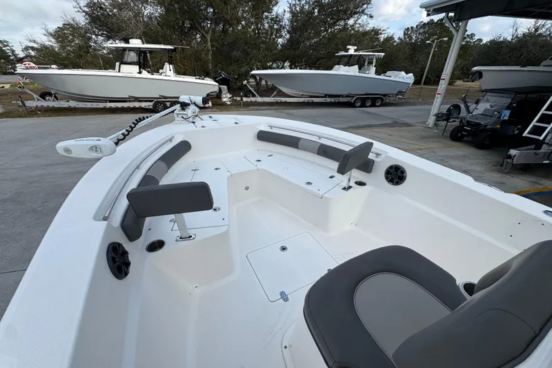 Slide: The Image of 2021 Sea Born LX24 Center Console boat with spacious seating and modern design. - 19