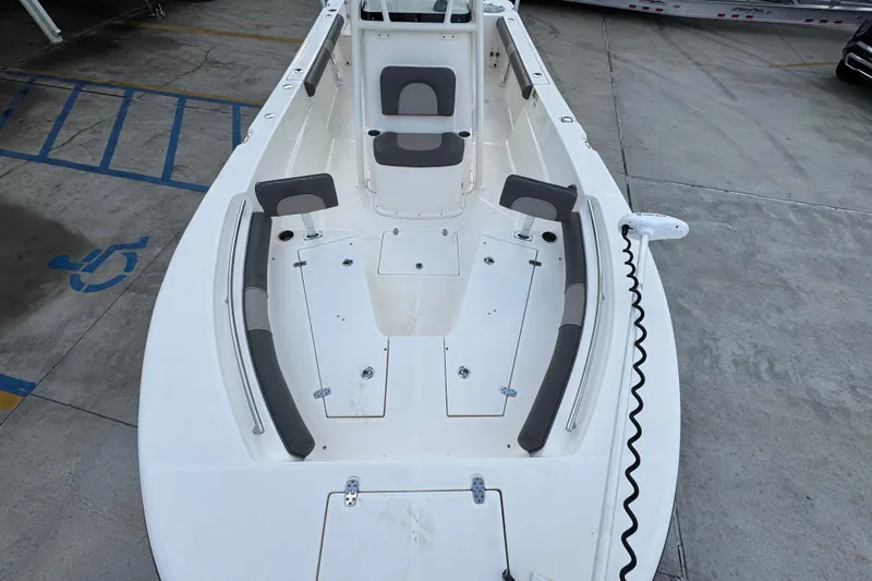Slide: The Image of 2021 Sea Born LX24 Center Console boat with spacious seating and storage compartments. - 20