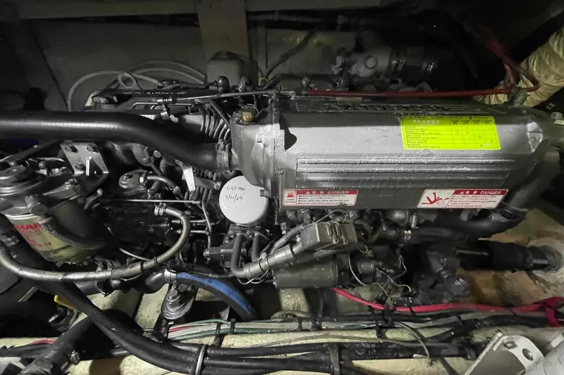 Slide: The Image of Bathroom interior of 1987 Chris-Craft 426 Catalina yacht, featuring sink, toilet, and shower. - 16