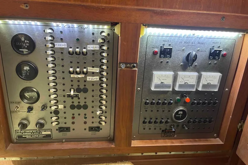 Slide: The Image of Engine of 1987 Chris-Craft 426 Catalina, featuring red components and black hoses. - 20