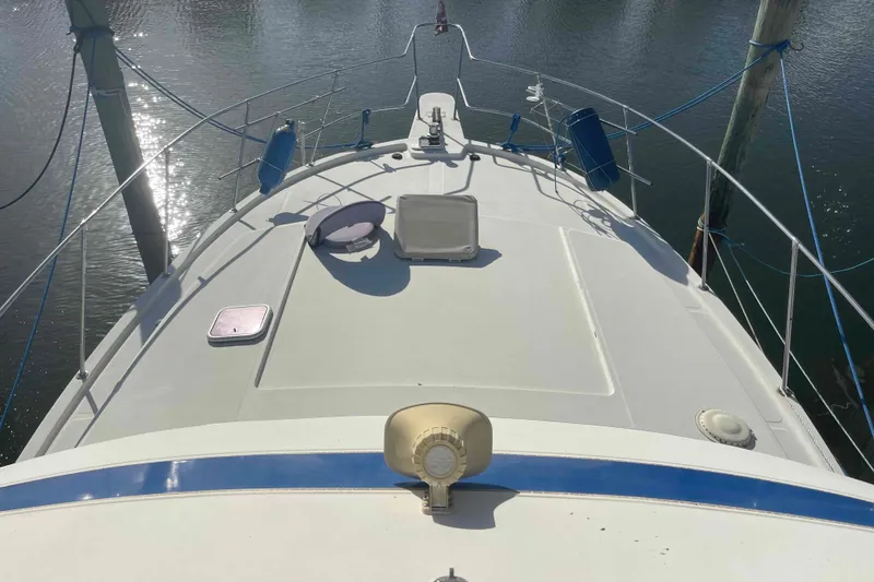 Slide: The Image of Engine compartment of 1987 Chris-Craft 426 Catalina boat, showcasing detailed mechanical components. - 22