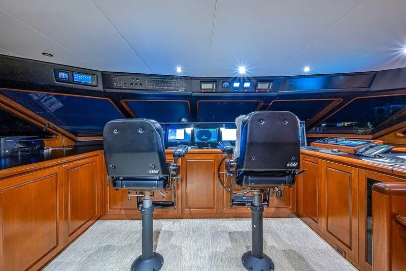 Slide: The Image of Luxurious 2000 Christensen Raised Pilothouse yacht interior with modern navigation equipment. - 12