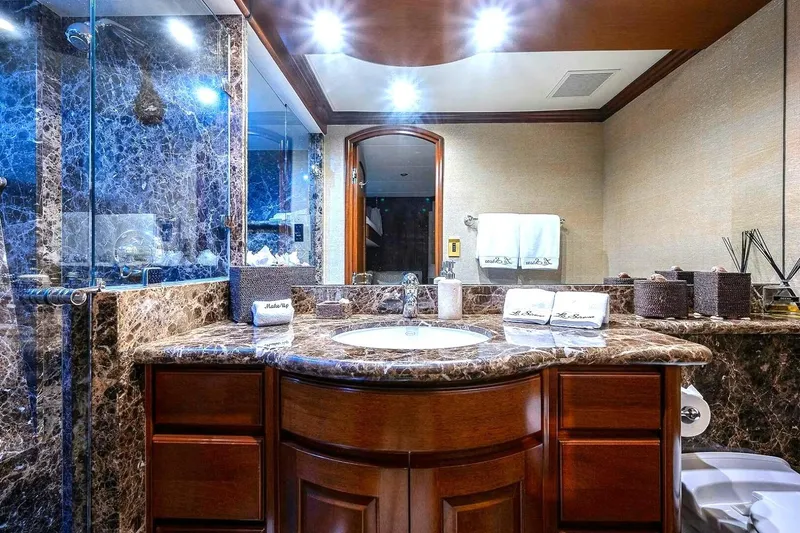 Slide: The Image of Luxurious bathroom with marble countertops in a 2000 Christensen Raised Pilothouse yacht. - 22