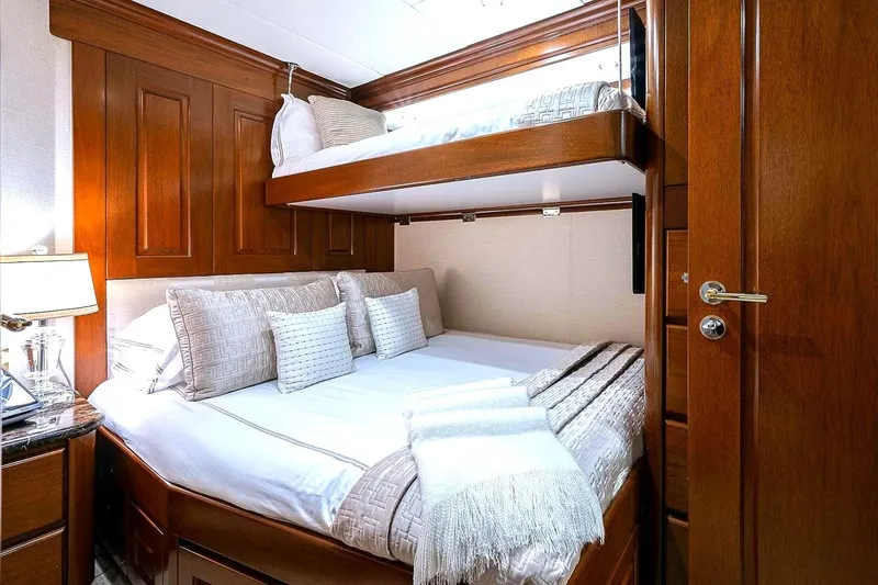 Slide: The Image of Luxurious cabin interior of 2000 Christensen Raised Pilothouse yacht with wooden finishes. - 23