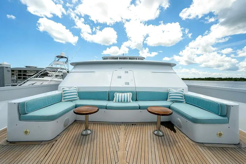 Slide: The Image of Luxurious 2000 Christensen Raised Pilothouse yacht deck with elegant seating and ocean view. - 30