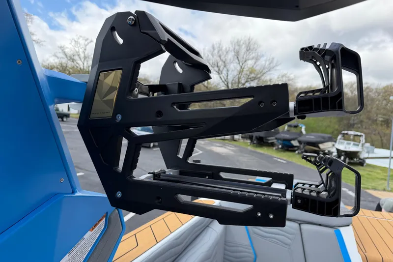 Slide: The Image of 2026 Nautique Super Air Nautique G25 wakeboard rack, sleek design, outdoor setting. - 22