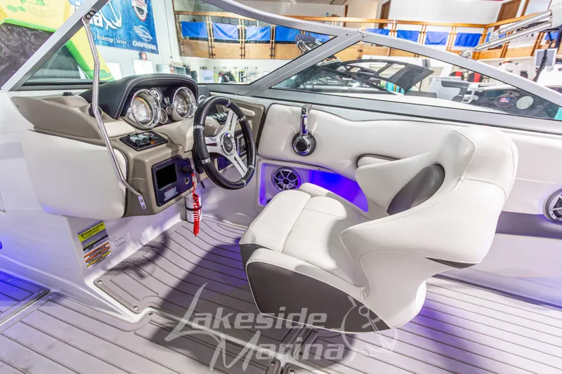 Slide: The Image of 2017 Crownline Eclipse E1 XS boat interior with steering wheel and dashboard. - 20