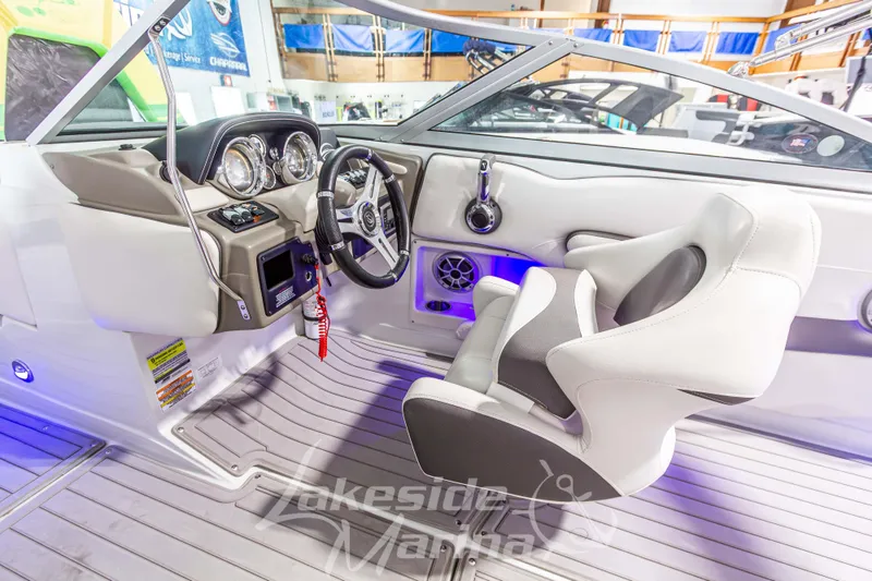 Slide: The Image of 2017 Crownline Eclipse E1 XS boat interior with modern dashboard and steering wheel. - 21