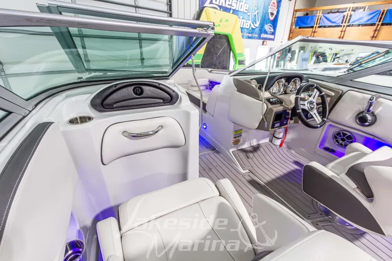 Slide: The Image of 2017 Crownline Eclipse E1 XS boat interior with modern dashboard and seating. - 24