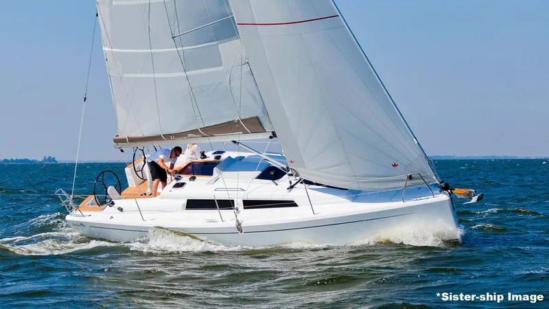 The Image of 2018 Hanse 315 sailboat navigating open waters under full sail. - 0