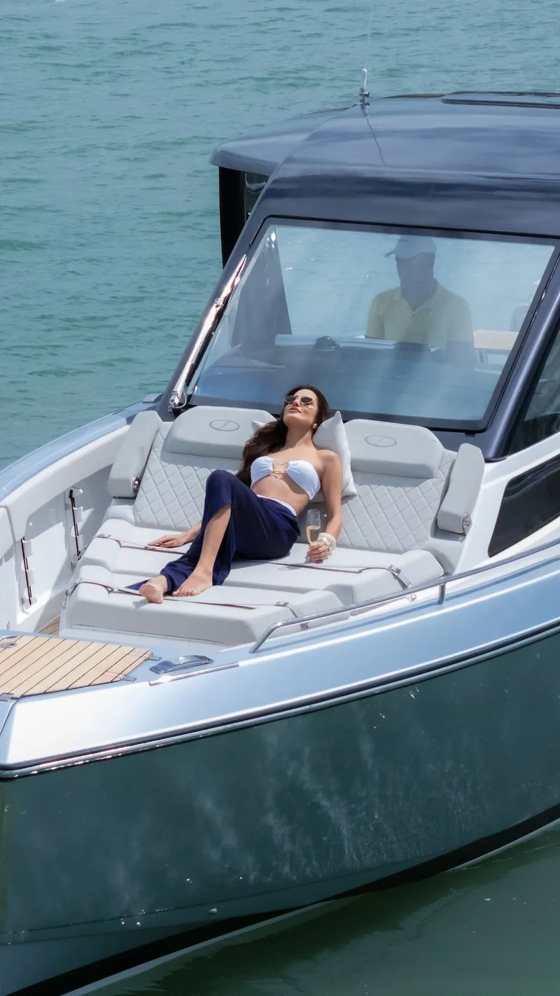 Slide: The Image of Woman relaxing on Schaefer V34 yacht, 2027 model. - 9