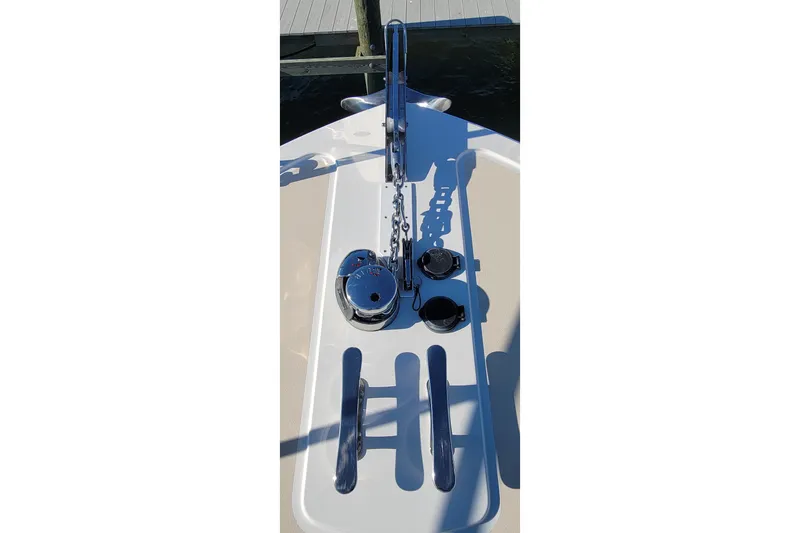 Slide: The Image of Bow deck of 2017 MJM 40z Downeast boat with anchor chain and cleats. - 9