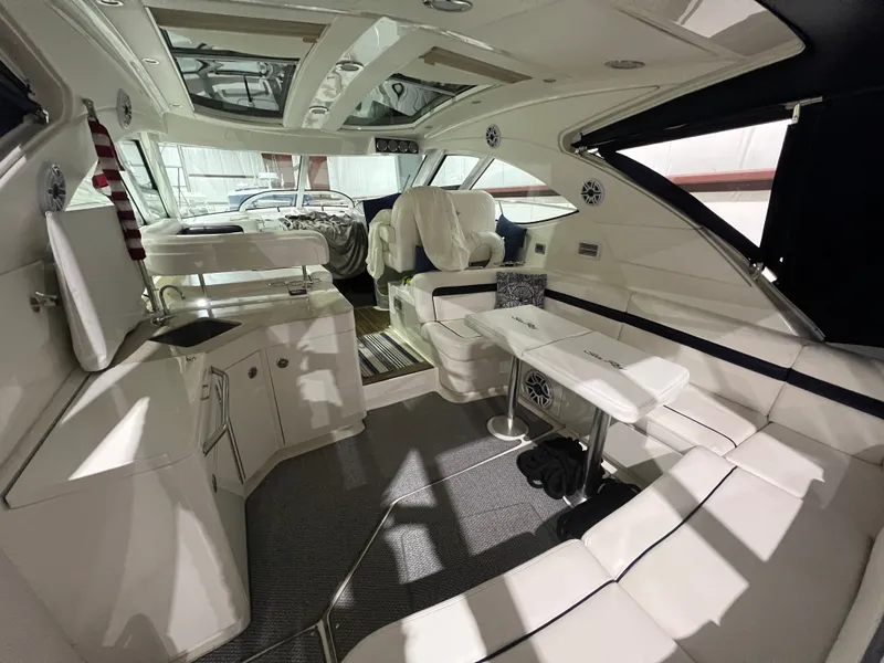 Slide: The Image of Interior of 2010 Sea Ray 470 Sundancer, luxurious design. - 10