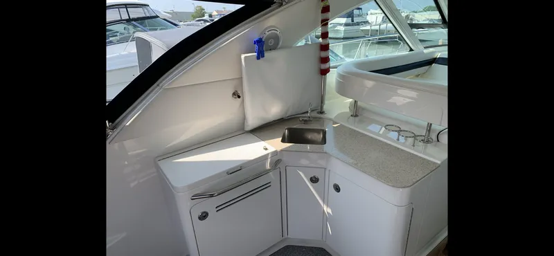 Slide: The Image of Interior of 2010 Sea Ray 470 Sundancer with kitchenette. - 13