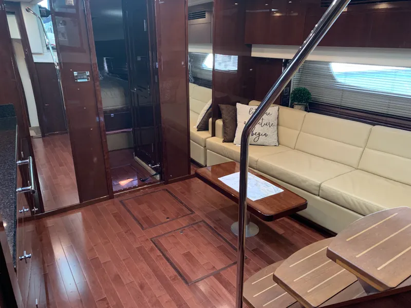 Slide: The Image of Interior of 2010 Sea Ray 470 Sundancer with elegant furnishings. - 17