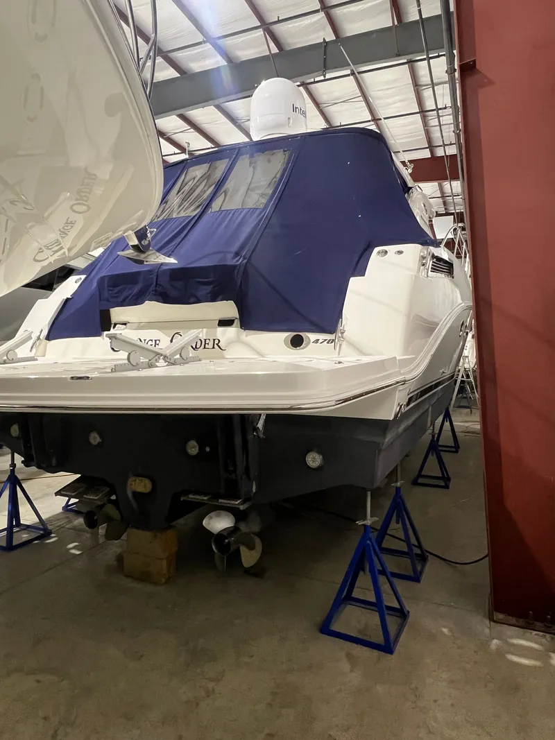 Slide: The Image of 2010 Sea Ray 470 Sundancer yacht stored on stands. - 6