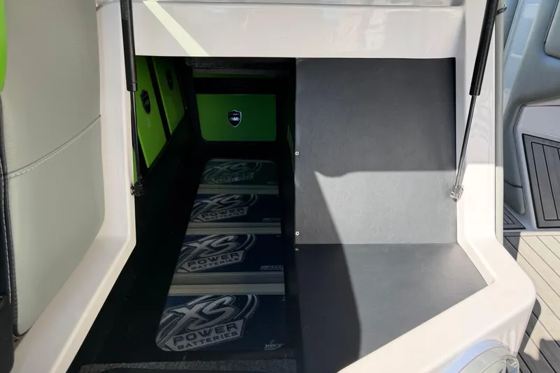 Slide: The Image of 2014 Nautique Super Air Nautique G23 battery compartment with XS Power Batteries. - 13