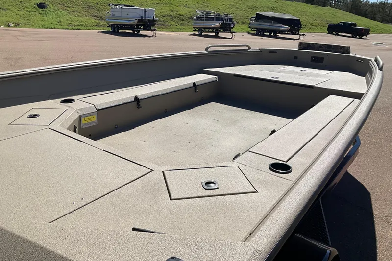 Slide: The Image of 2026 Excel 183 Tomahawk boat interior with spacious deck and storage compartments. - 3