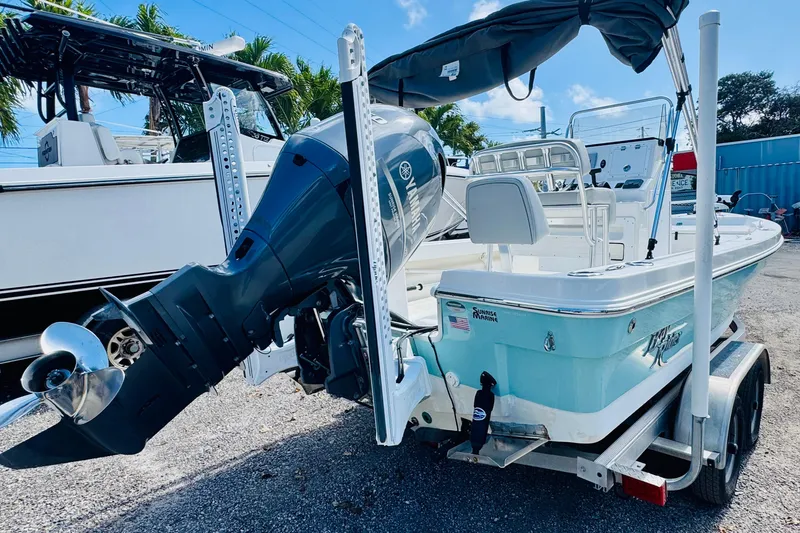 Slide: The Image of 2023 KenCraft 219 Bay Rider boat with Yamaha outboard motor on trailer. - 4