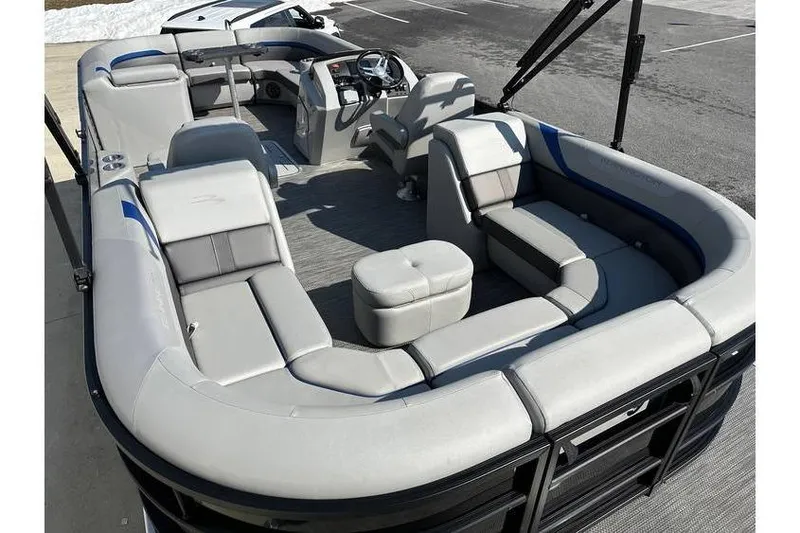 Slide: The Image of 2022 Bennington 24 SXSR Tritoon with Yamaha Vmax 250 SHO, featuring spacious seating and modern design. - 11