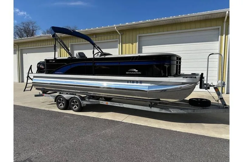 Slide: The Image of 2022 Bennington 24 SXSR Quad Bench Tritoon with Yamaha Vmax 250 SHO on trailer. - 5