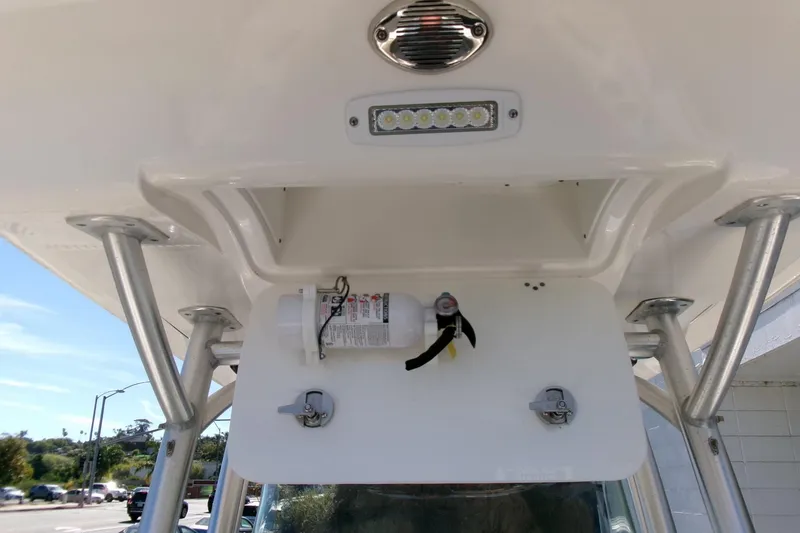 Slide: The Image of 2018 Sea Fox 248 Commander boat console with mounted fire extinguisher and LED light. - 16