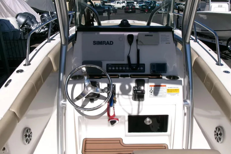Slide: The Image of 2018 Sea Fox 248 Commander boat console with steering wheel and Simrad electronics. - 19