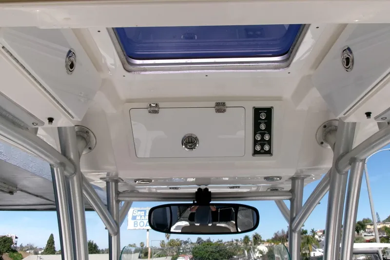 Slide: The Image of Interior view of a 2018 Sea Fox 248 Commander boat's control panel and roof hatch. - 20