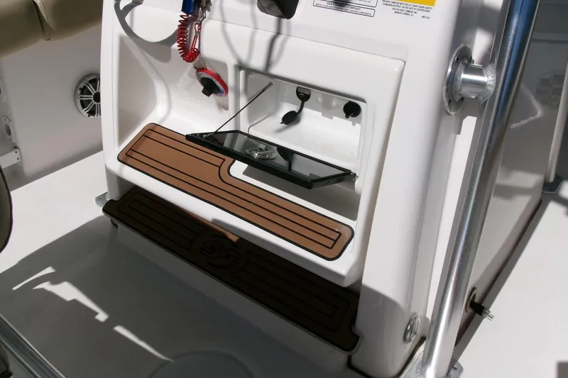 Slide: The Image of 2018 Sea Fox 248 Commander boat console with storage and control panel. - 23