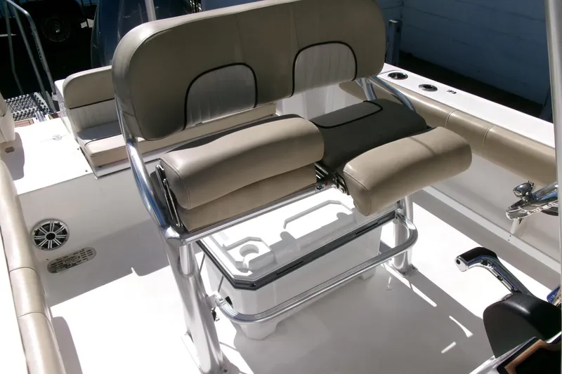 Slide: The Image of 2018 Sea Fox 248 Commander boat seating with beige cushions and stainless steel frame. - 24