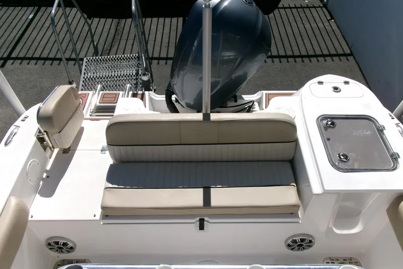 Slide: The Image of 2018 Sea Fox 248 Commander boat interior with seating and engine view. - 27