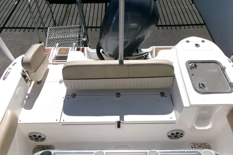 Slide: The Image of 2018 Sea Fox 248 Commander boat interior with seating and storage compartments. - 28