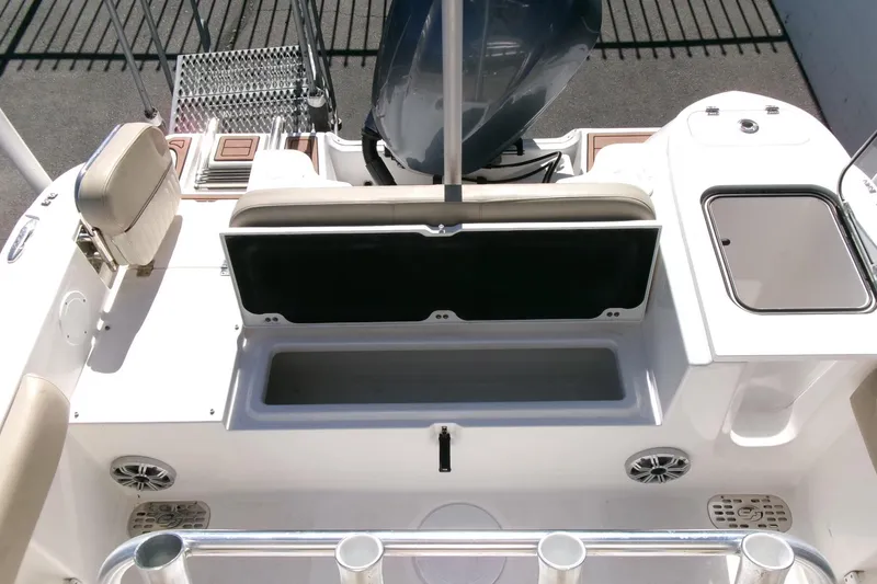 Slide: The Image of 2018 Sea Fox 248 Commander boat interior with open storage compartment and seating area. - 29
