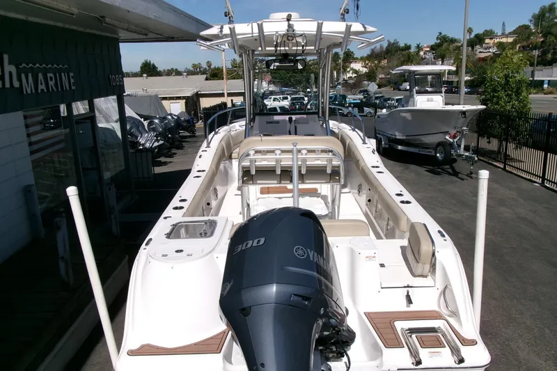 Slide: The Image of 2018 Sea Fox 248 Commander boat with Yamaha 300 engine at a dealership. - 34