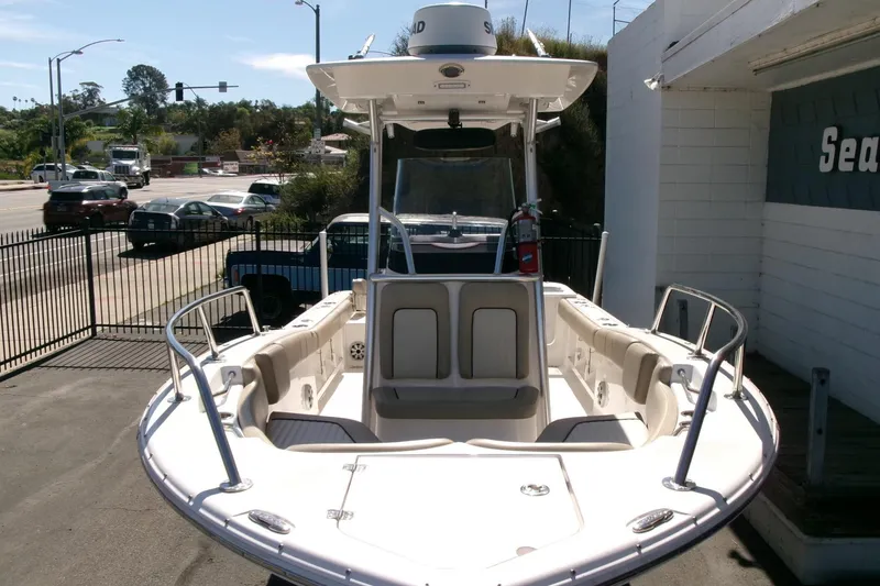 Slide: The Image of 2018 Sea Fox 248 Commander boat displayed outdoors, showcasing spacious seating and sleek design. - 35