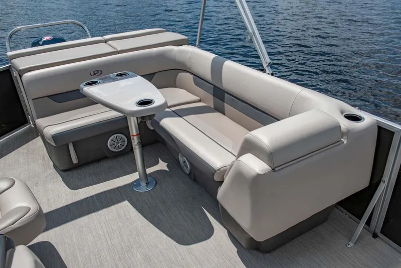 Slide: The Image of Manufacturer Provided Image: Princecraft Vectra 23 (2020) pontoon boat interior with beige seating and table on water. - 7