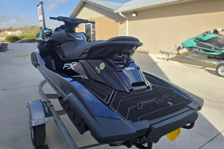 Slide: The Image of 2026 Yamaha WaveRunner FX SVHO on trailer, sleek black design, parked outdoors. - 3