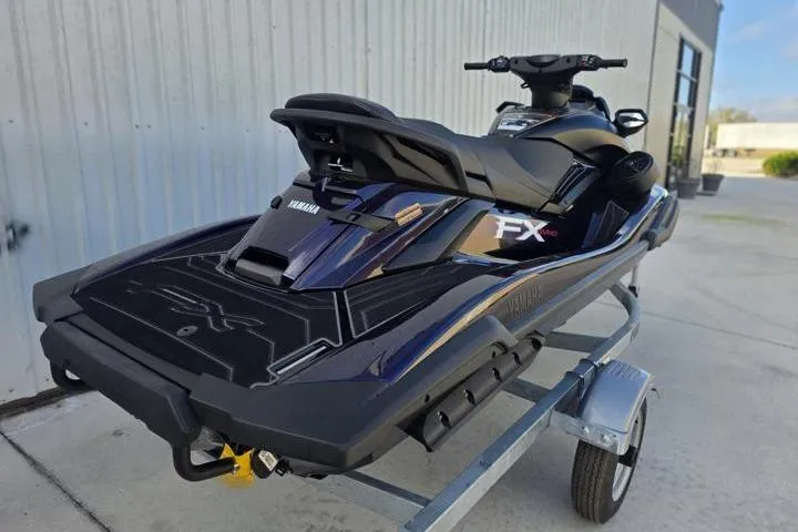 Slide: The Image of 2026 Yamaha WaveRunner FX SVHO on trailer, sleek black design, parked outdoors. - 4